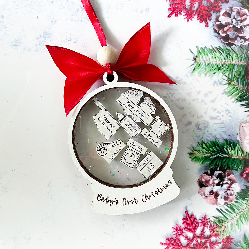 Celebrate your baby's first Christmas this holiday season with a Baby's First Christmas ornament. Our personalized Baby's First Christmas ornament also makes a great gift for new parents or as a birth announcement for family and friends.