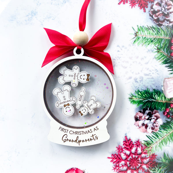 Celebrate the joy of becoming new grandparents with our exquisite "First Christmas As Grandparents" ornament. Handcrafted with love and attention to detail, this adorable keepsake is made with a high-quality laser engraved gingerbread design. 