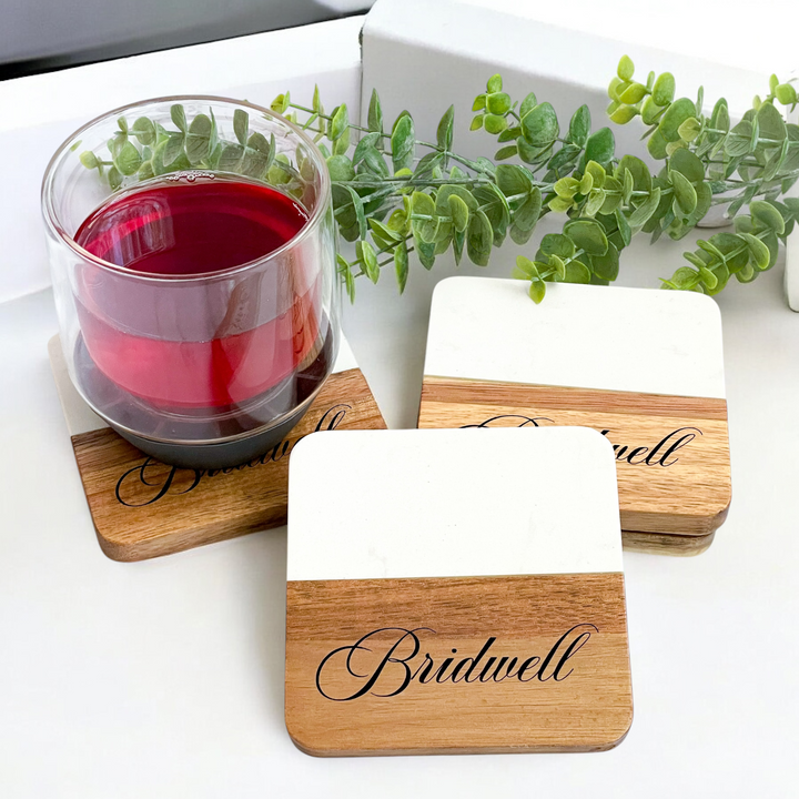 Branded Marble and Acacia Wood Coasters with engraved logo, ideal for corporate gifting, employee appreciation, and promotional items, combining elegance and functionality for professional branding.