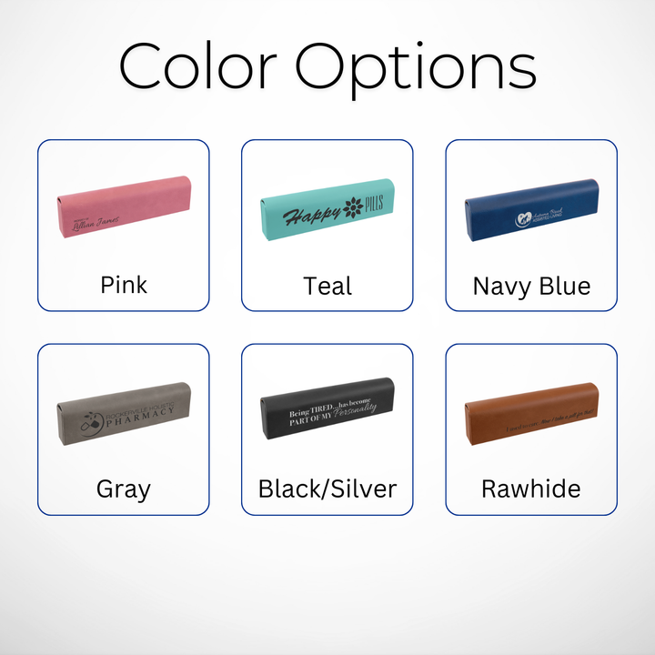 Color options for Laserable Leatherette Weekly Pill Box Organizer, showcasing six colors: pink, teal, navy blue, gray, black/silver, and rawhide. Each stylish case can be customized for branding or personal use, perfect for travel or home organization.