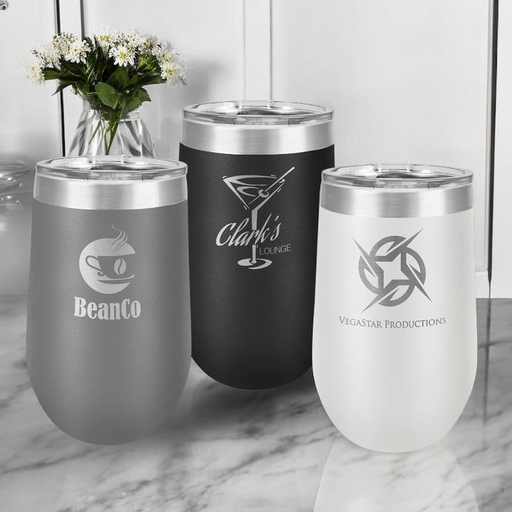 Custom 16oz vacuum insulated stainless steel stemless tumblers with lids, displayed in gray, black, and white. Perfect for wine, coffee, or cocktails, these tumblers are ideal for corporate branding, promotional gifts, or personalized drinkware.