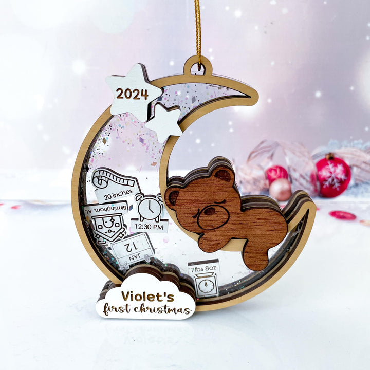 Front view of personalized Baby’s First Christmas ornament with teddy bear and moon design.