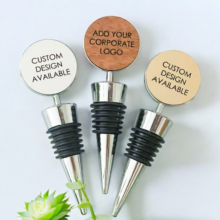 Custom design available wine bottle stoppers in gold, silver, and wood finishes, perfect for corporate logos, personalized branding, or promotional gifts.