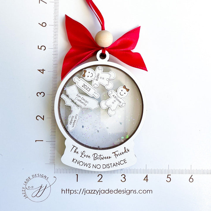 Custom friendship Christmas ornament symbolizing connection across miles, featuring heartfelt “Love Between Friends” message.