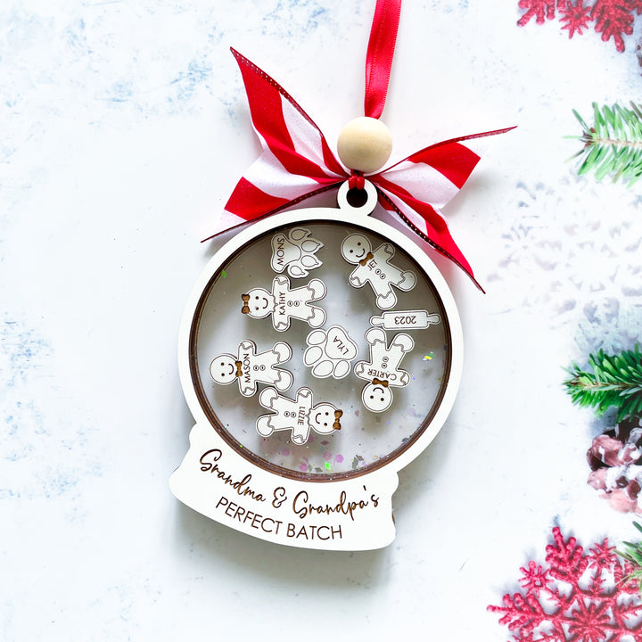 Front view of personalized Grandma and Grandpa's Perfect Batch ornament with gingerbread charms for grandkids and pets.