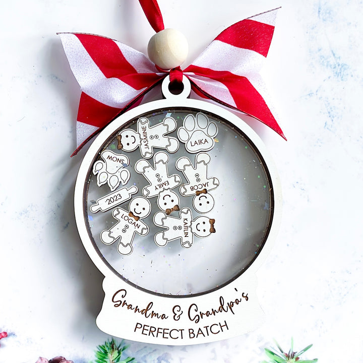 Large view of personalized Grandma and Grandpa's Perfect Batch ornament with gingerbread charms for grandkids and pets.