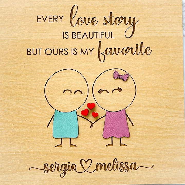 Custom love story keepsake gift featuring stick figures and the phrase 'Every love story is beautiful, but ours is my favorite.'  Personalized with the couple's names.