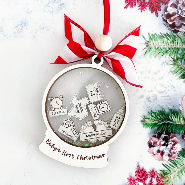 Personalized Baby's First Christmas Ornament  – Custom snow globe ornament for newborns with name and birth stats.