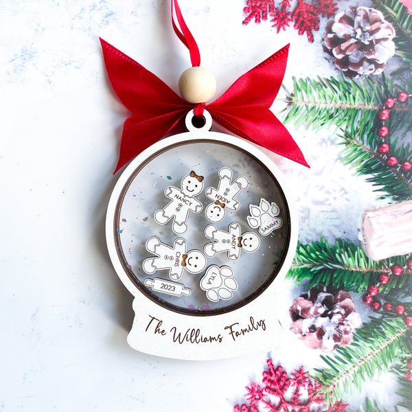 Personalized family Christmas ornament with pets, featuring custom family names and pet illustrations, perfect holiday decoration for dog and cat lovers.