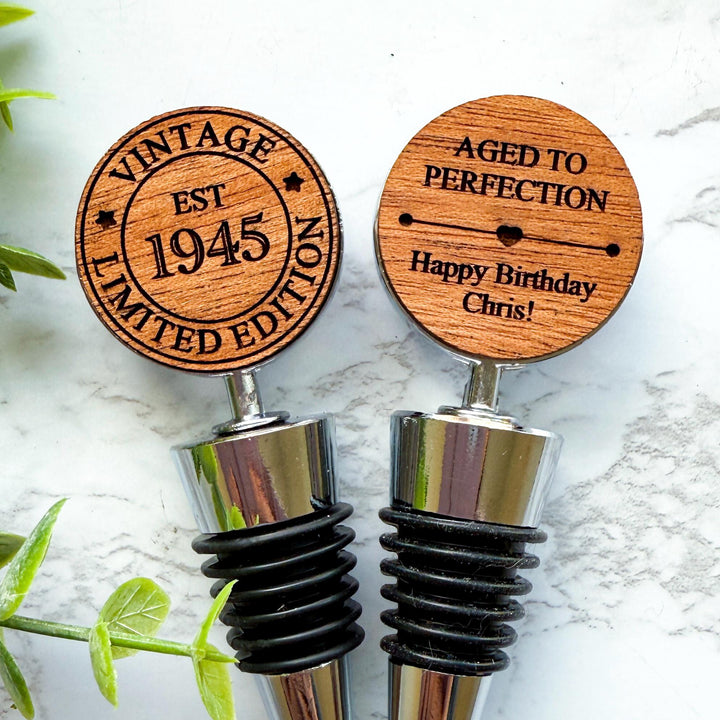 Custom wooden wine stoppers designed for a 80th birthday.  Vintage Limited Edition EST 1945 design.  Ideal for milestone birthday celebrations and unique personalized gifts for wine lovers.