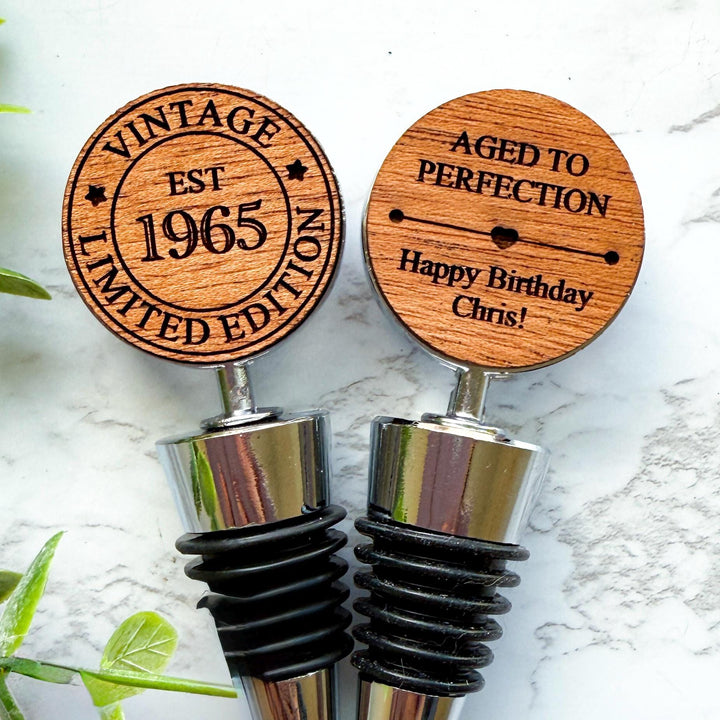 Custom wooden wine stoppers designed for a 60th birthday.  Vintage Limited Edition EST 1965 design.  Ideal for milestone birthday celebrations and unique personalized gifts for wine lovers.