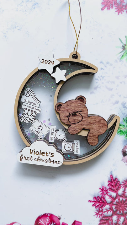 Newborn first Christmas keepsake ornament featuring name, birth date, and birth stats.