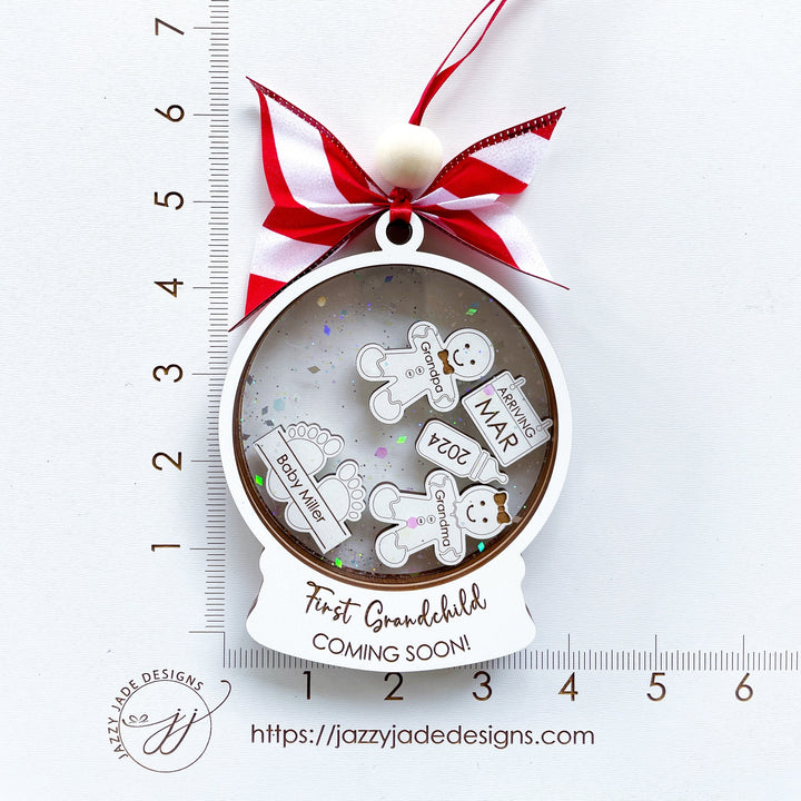 Size of Christmas ornament for new grandparents featuring personalized pregnancy announcement and baby details.