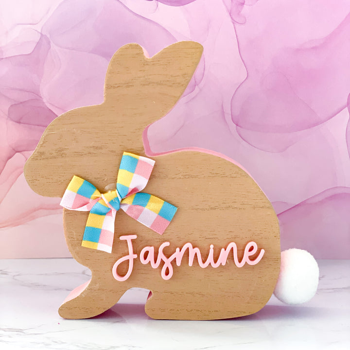 Engraved wooden Easter bunny personalized with name cute basket stuffer and keepsake gift for kids or toddlers charming handcrafted wooden accessory for Easter baskets perfect for springtime decoration personalized gift celebrating Easter joyfully