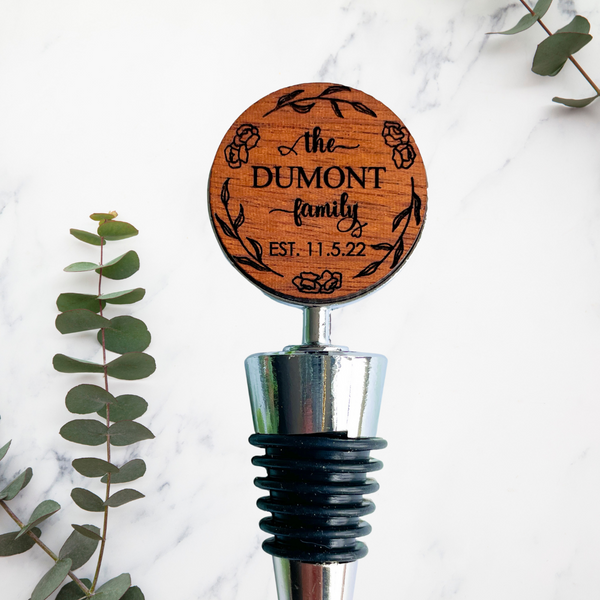 Personalized wine stoppers for wedding engagement or anniversary gift featuring engraved family name custom handmade bottle stopper perfect for couples elegant bar accessory and wine lover keepsake celebrating love unity and meaningful special occasions